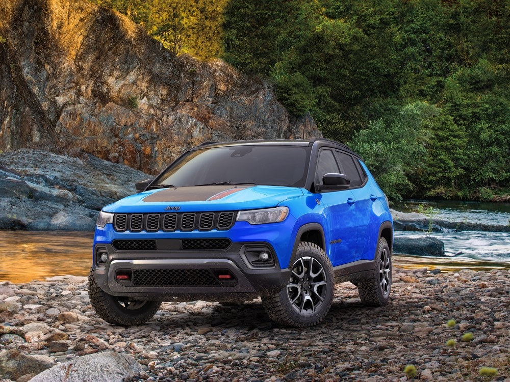  Jeep Compass parked at edge of water