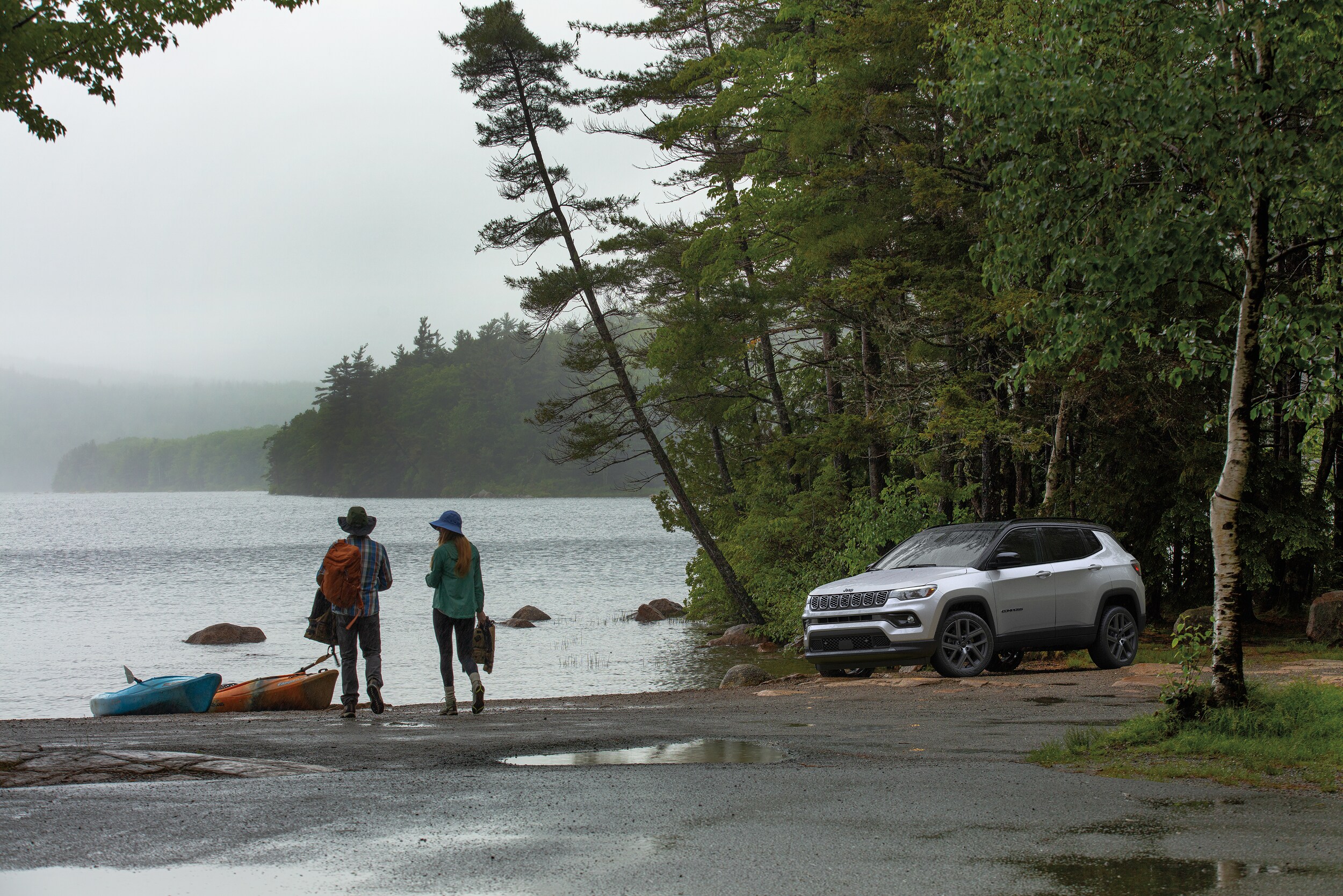  2026 Jeep Compass by water with kayaks