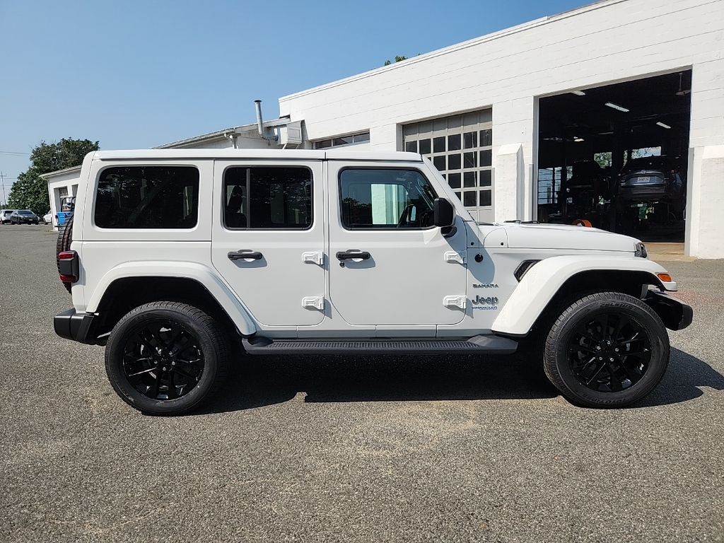 Used 2021 Jeep Wrangler Unlimited Sahara 4XE with VIN 1C4JJXP6XMW658576 for sale in Greenfield, MA