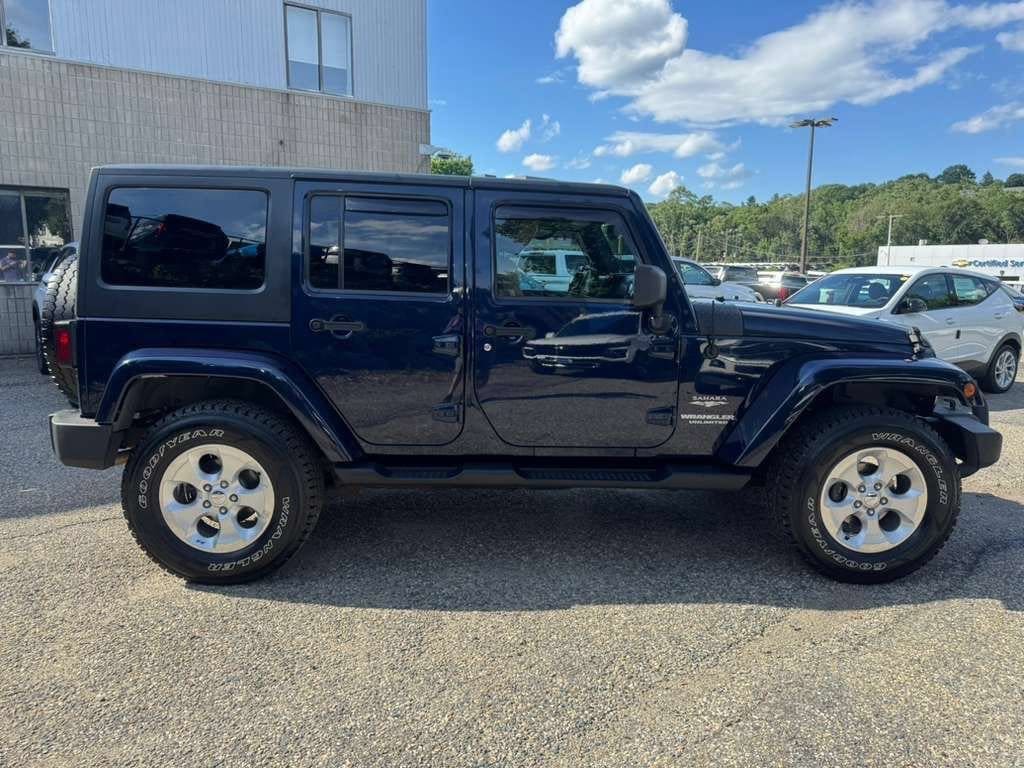 Used 2013 Jeep Wrangler Unlimited Sahara with VIN 1C4BJWEG1DL618480 for sale in Arlington, MA