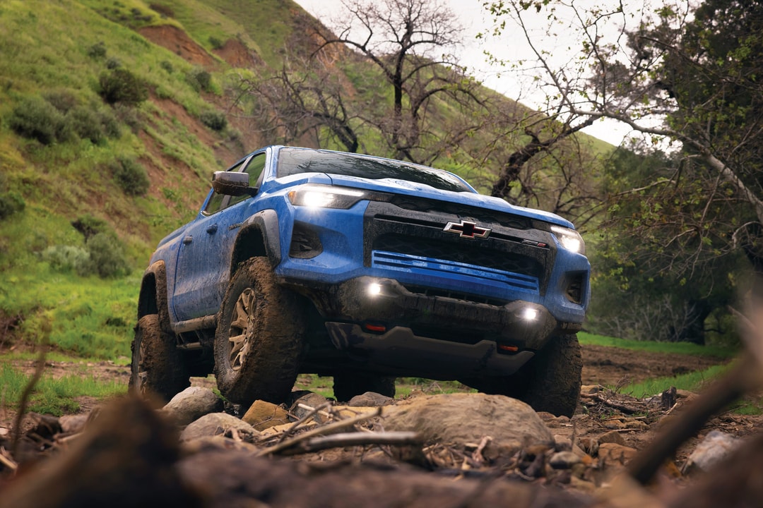 2026 Chevy Colorado driving on rocky hill