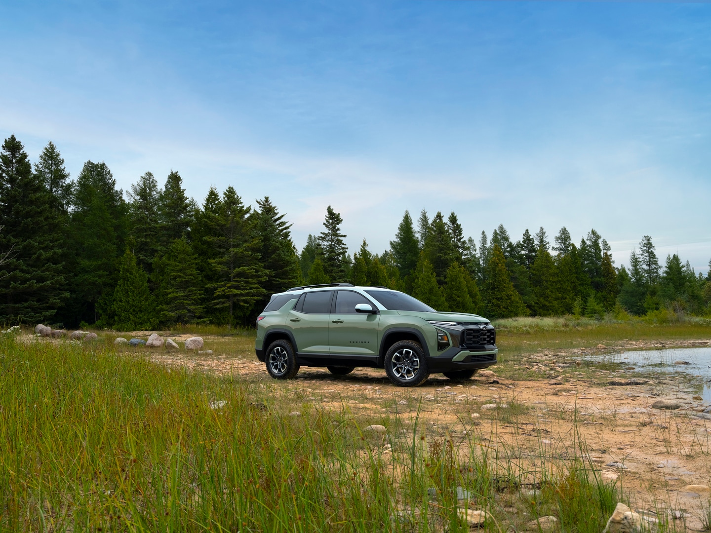 Green Chevrolet Equinox by the water