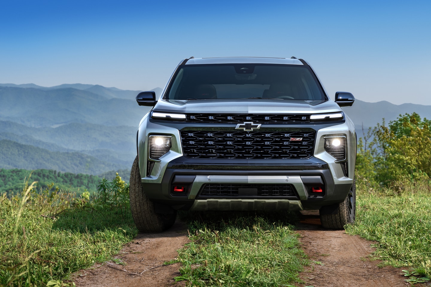  2026 Chevrolet Traverse driving on dirt trail