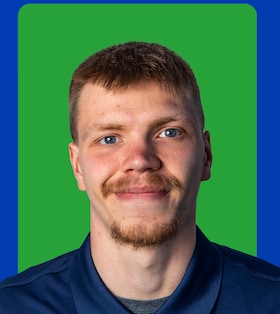 Staff member Cooper Manning from cf5a3eebf02e