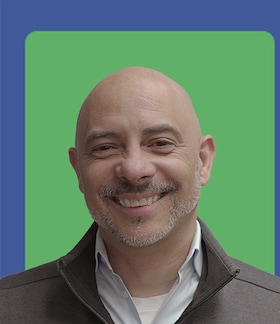 Staff member Paul Santiago from 56408e9969f3