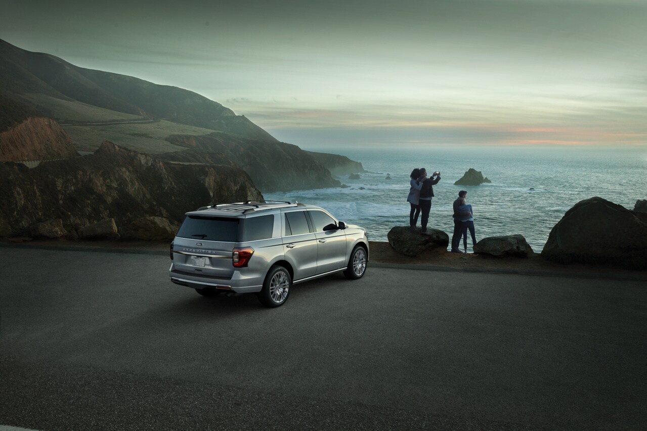 Ford Expedition parked at lookout over water