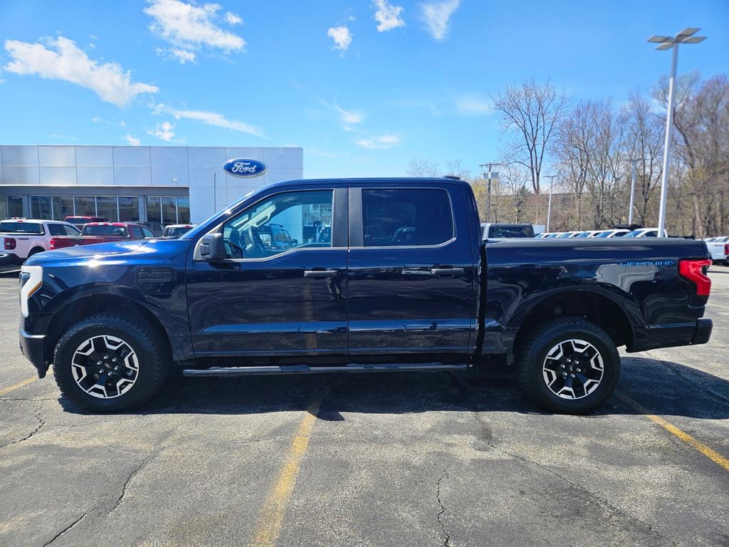 Used 2023 Ford F-150 Lightning Pro with VIN 1FTVW1EL9PWG01461 for sale in Beverly, MA