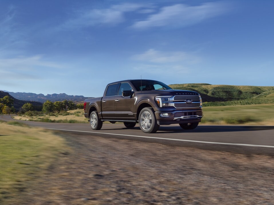  2025 Ford F-150 driving on the road