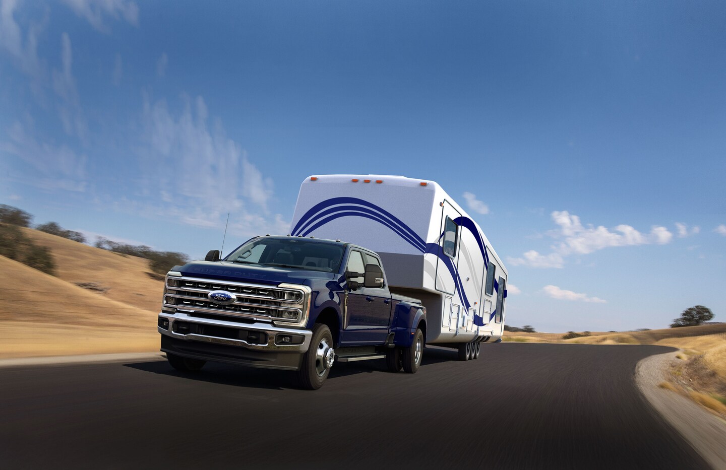 2026 Ford F-350 towing a large camper