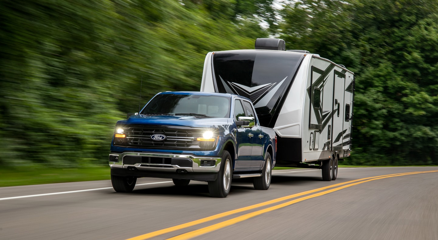  2025 Ford F-150 towing a camper