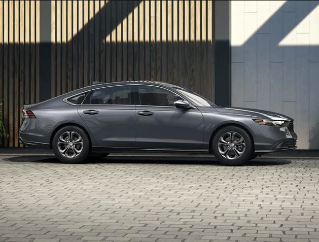 Honda Accord side view on cobblestone street