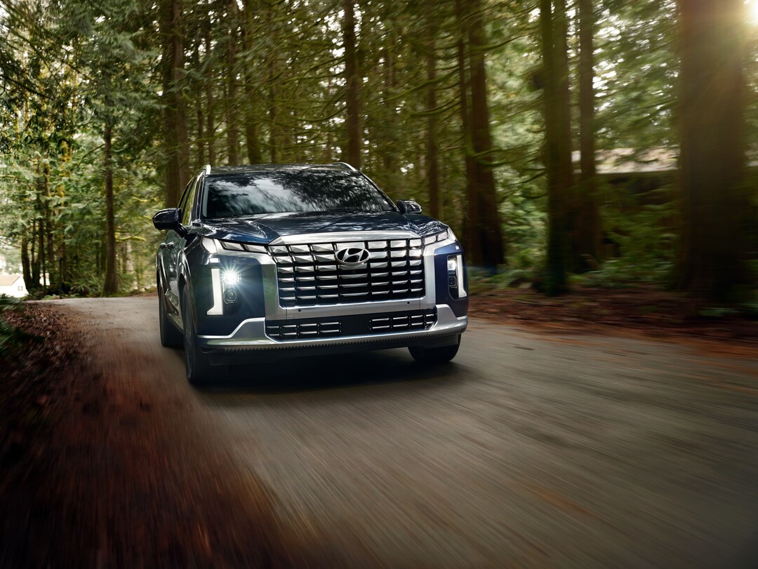  2026 Hyundai Palisade driving on dirt road