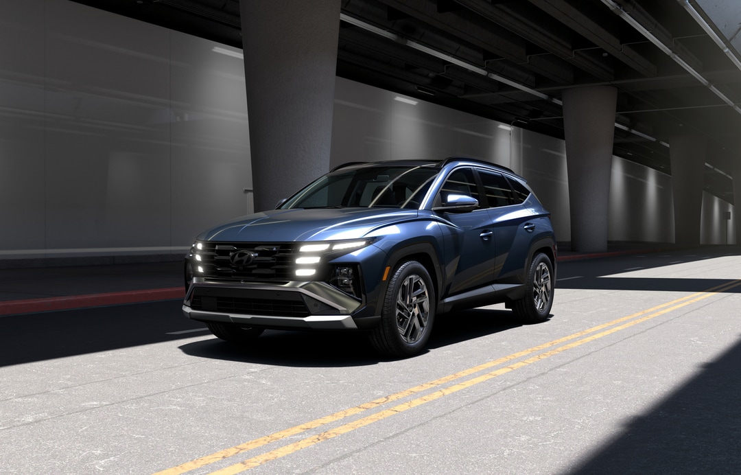  Person cheerfully signing documents.