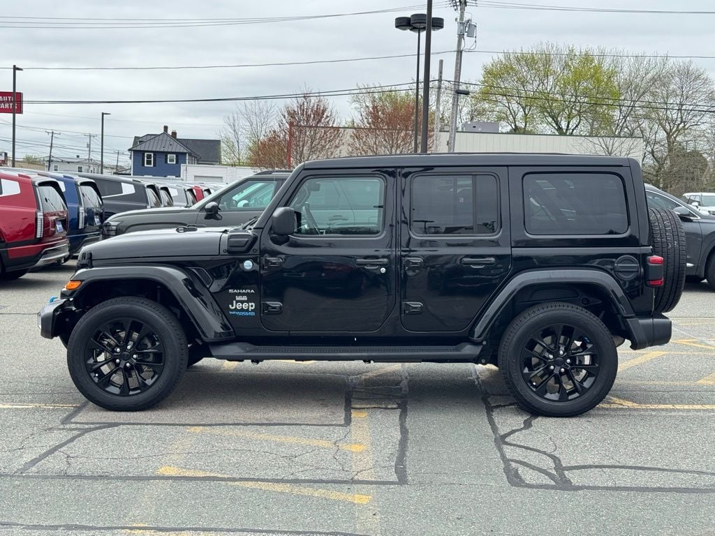 Used 2022 Jeep Wrangler Unlimited Sahara 4XE with VIN 1C4JJXP65NW232361 for sale in Milford, MA