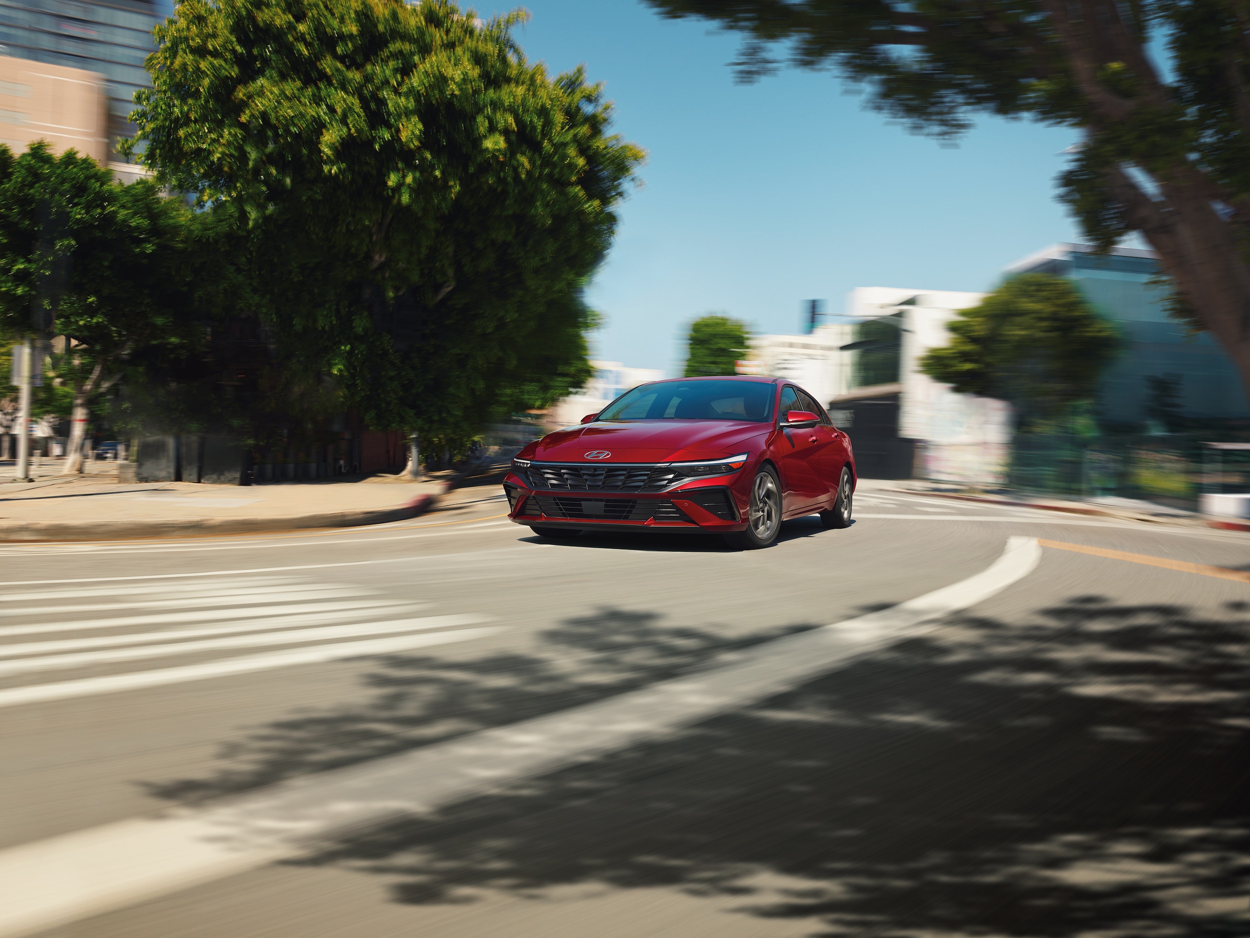  Hyundai Elantra driving through town