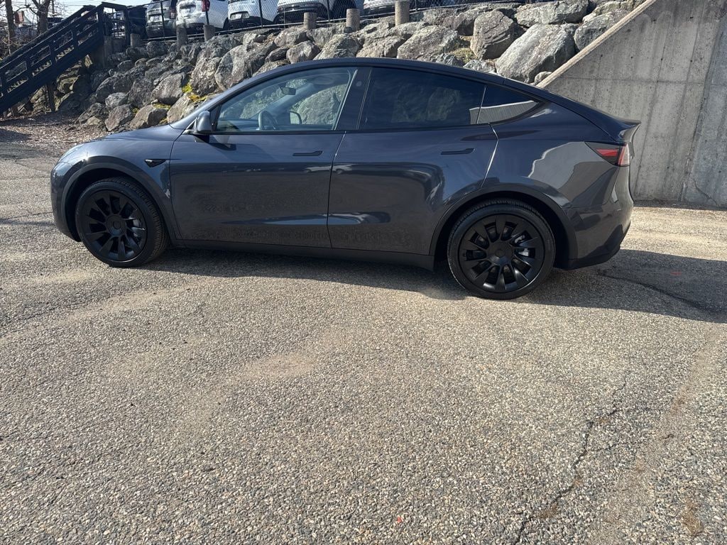 Used 2024 Tesla Model Y Long Range with VIN 7SAYGDEE1RA243793 for sale in Arlington, MA