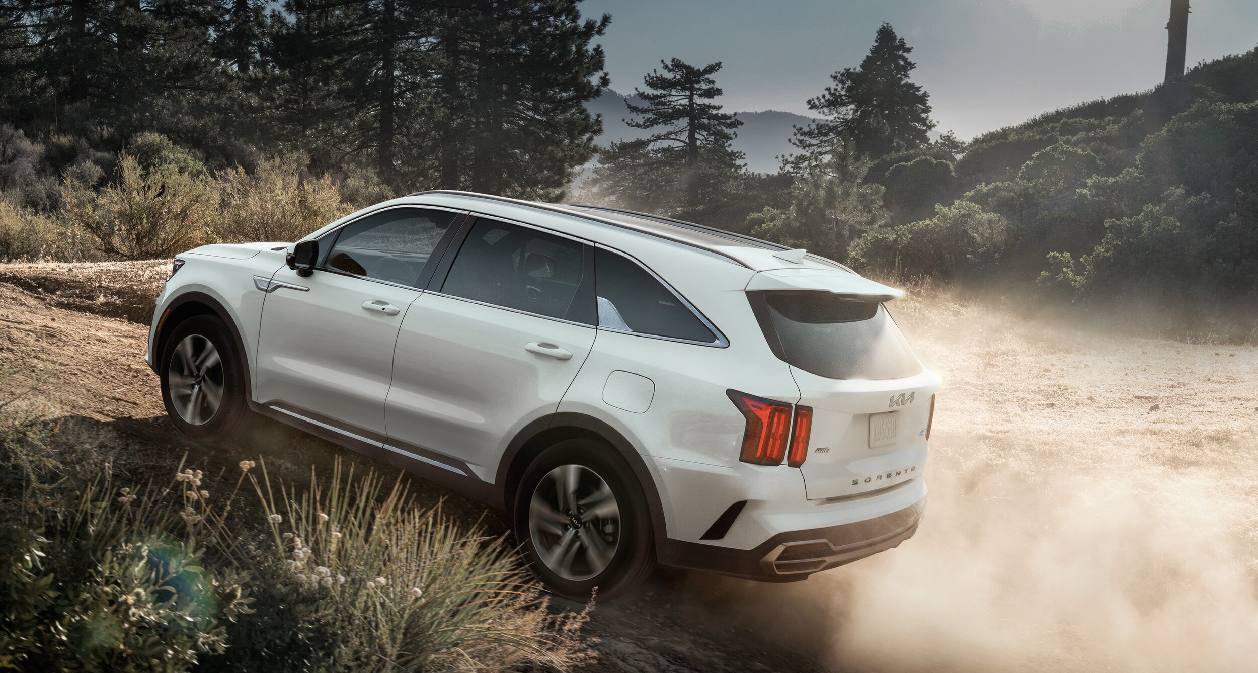Kia Sorento Plug-In Hybrid driving on dirt road