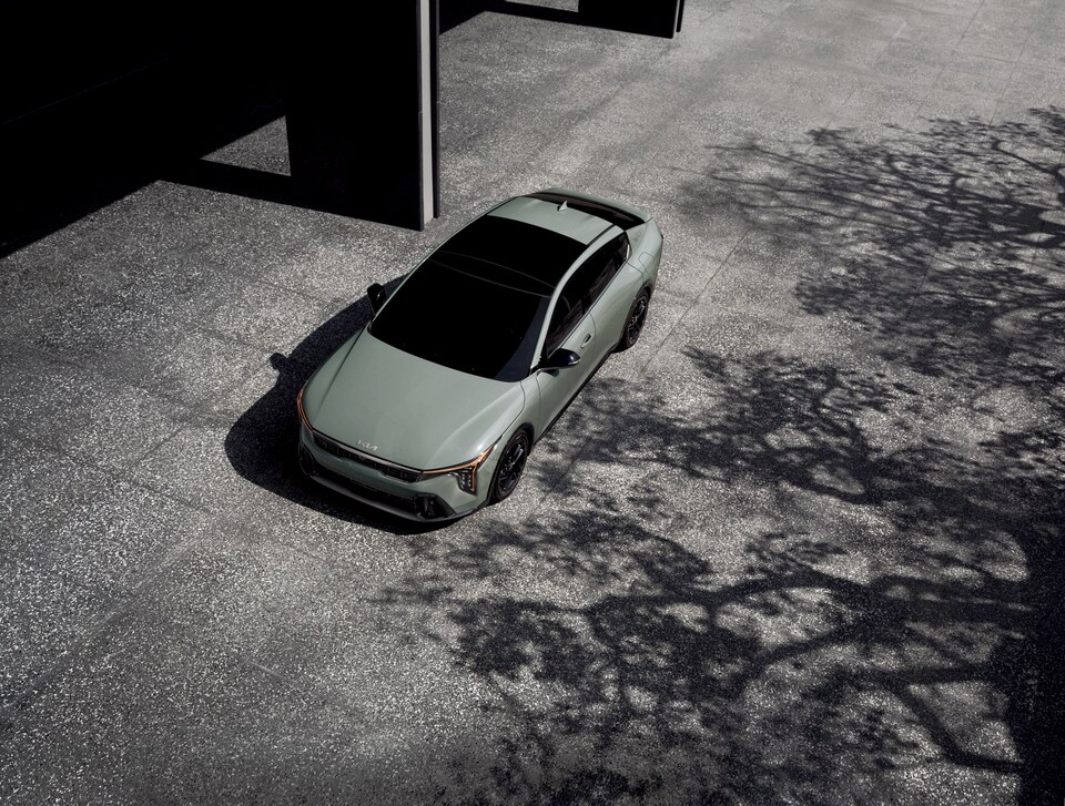 Green Kia K4 overhead view