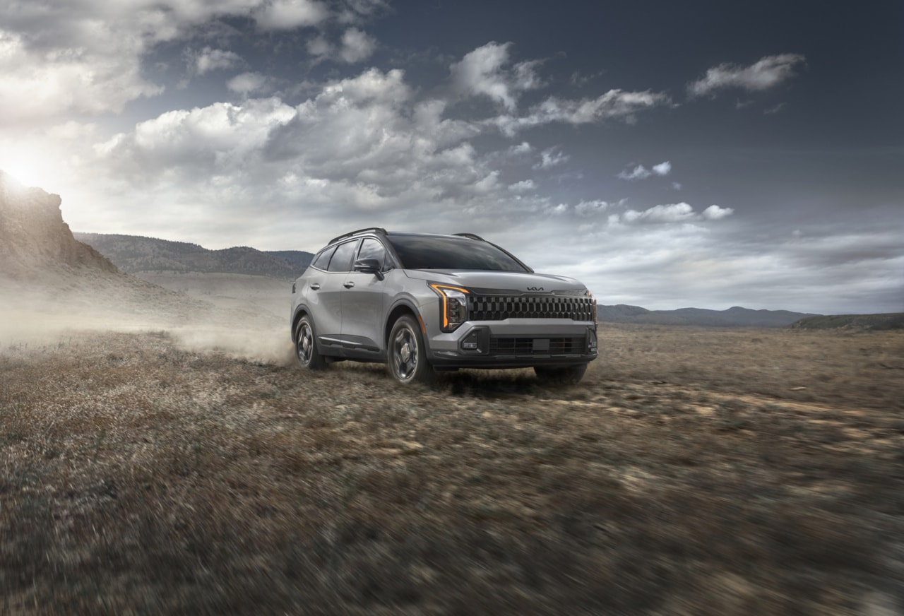  2026 Kia Sportage Plug-in Hybrid on dirt road
