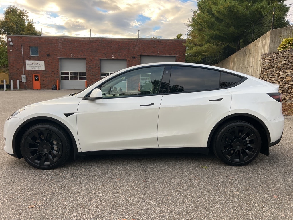 Used 2023 Tesla Model Y Long Range with VIN 7SAYGDEE7PA054935 for sale in Kansas City