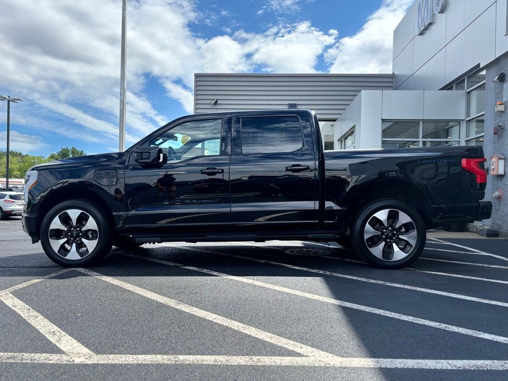 Used 2022 Ford F-150 Lightning Platinum with VIN 1FT6W1EV0NWG10584 for sale in Framingham, MA