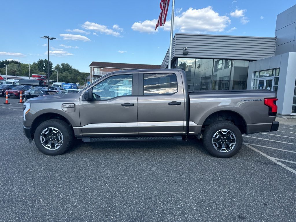 Used 2023 Ford F-150 Lightning Pro with VIN 1FTVW1EL4PWG08012 for sale in Framingham, MA