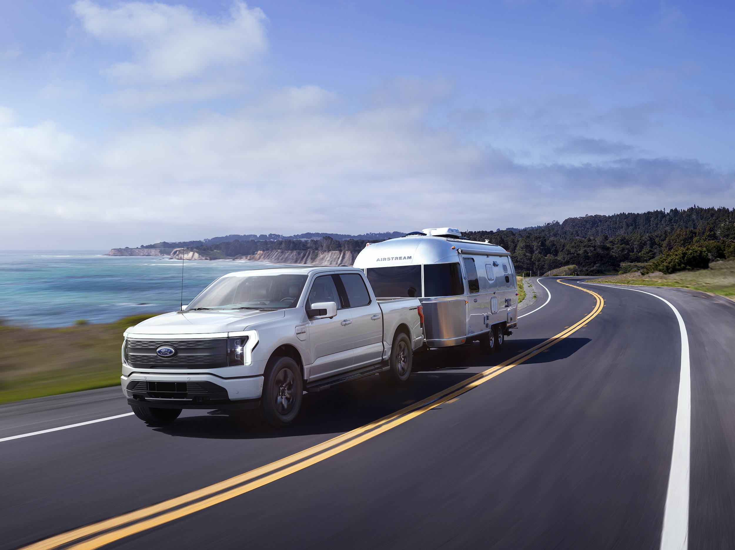 Ford F-150 Lightning towing a camper