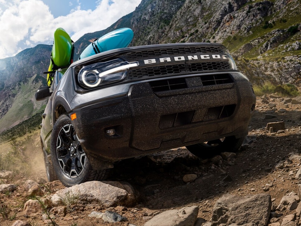 Ford Bronco Sport driving on rocky hill