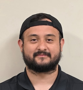 Staff member Carlos Guzman from 1379f61d2f58