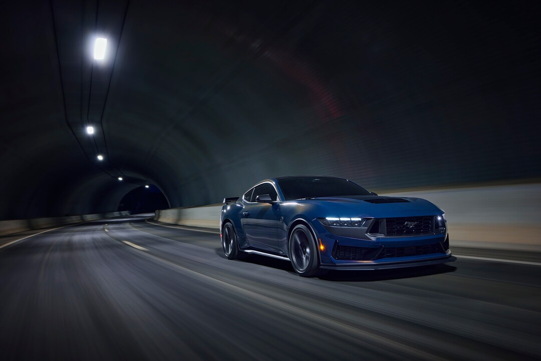  2025 Ford Mustang driving through tunnel