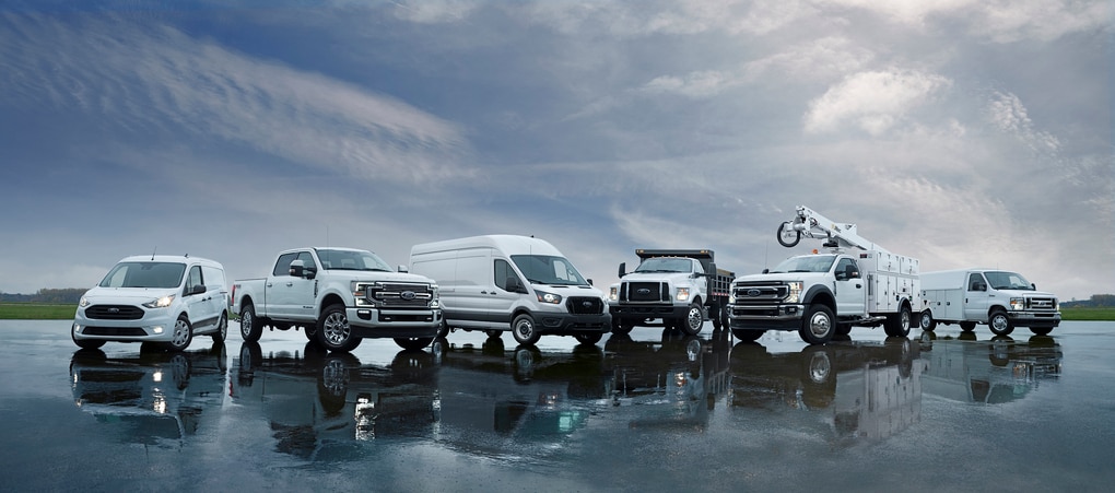  Person cheerfully signing documents.