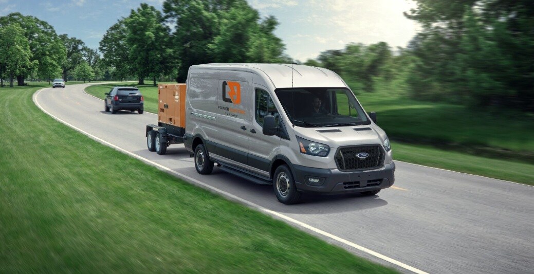  Ford Transit 250 towing a trailer