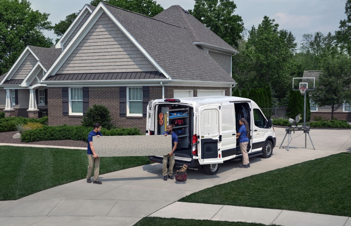  Person cheerfully signing documents.