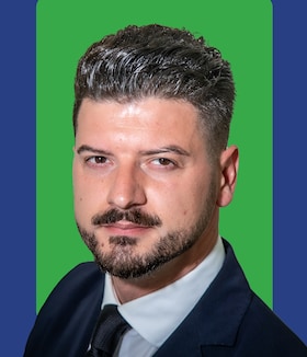 Staff member Suad Alushaj from 5481bde88b1c