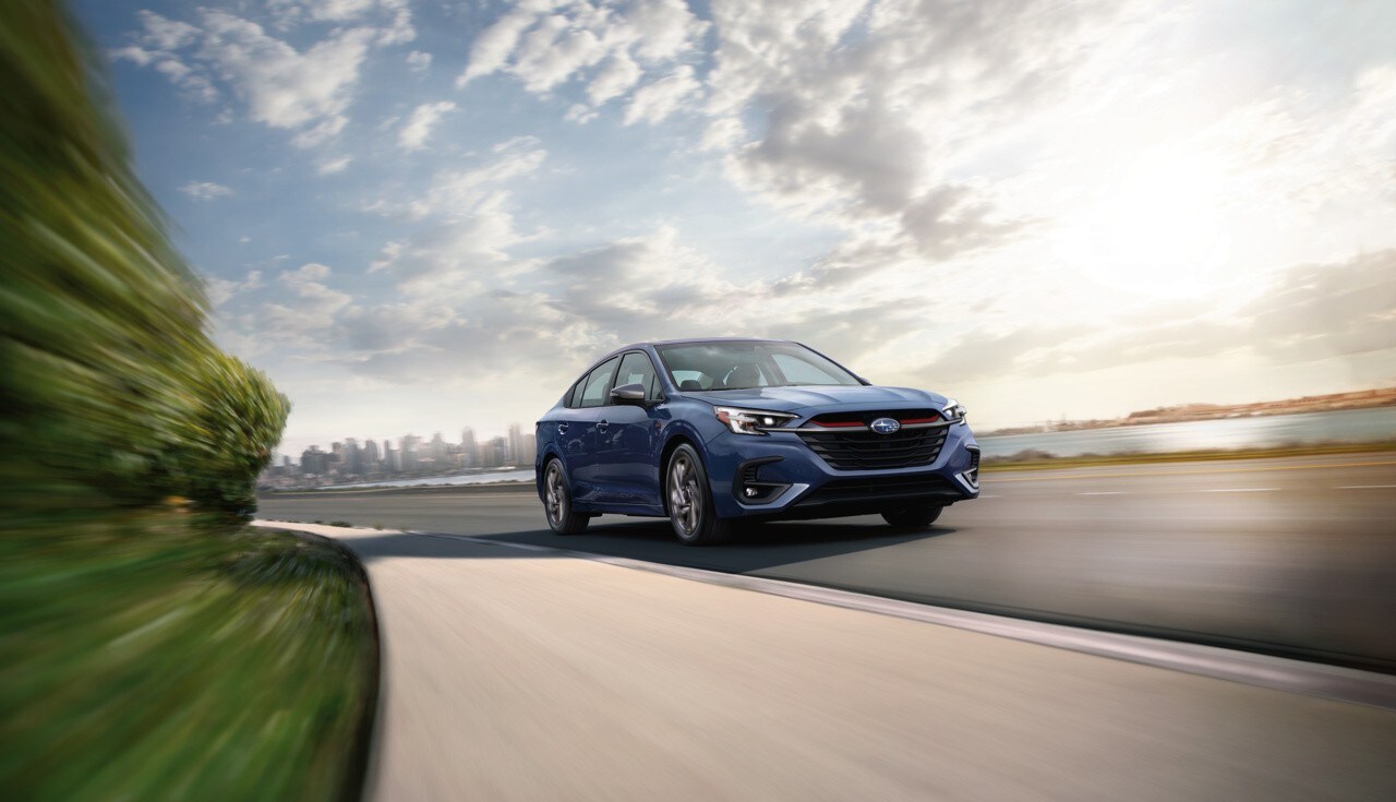 Subaru Legacy driving on highway