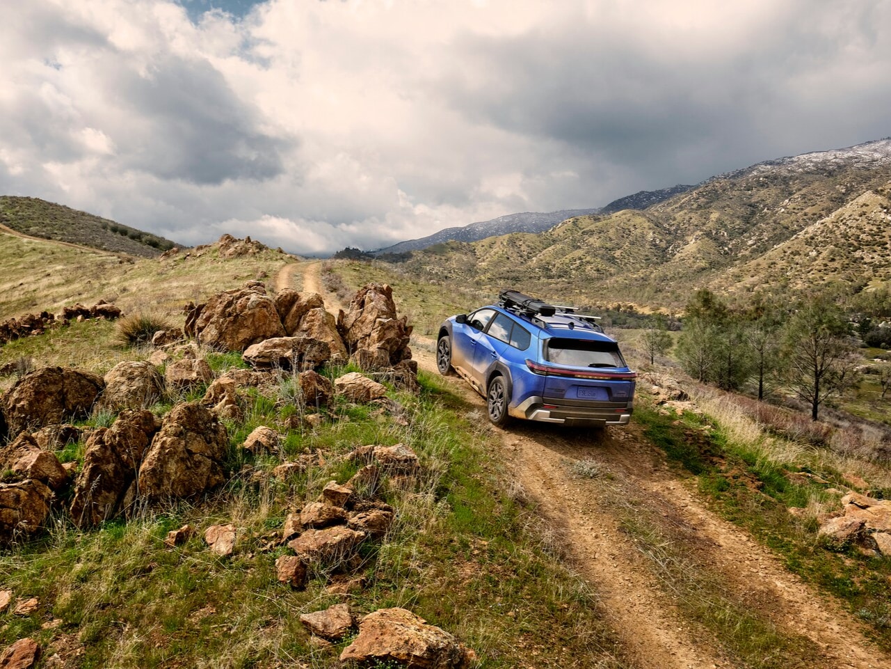 Subaru Trailseeker driving on dirt road