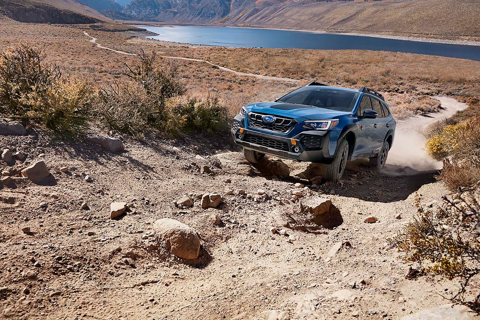 Subaru Outback Wilderness driving up rocky trail