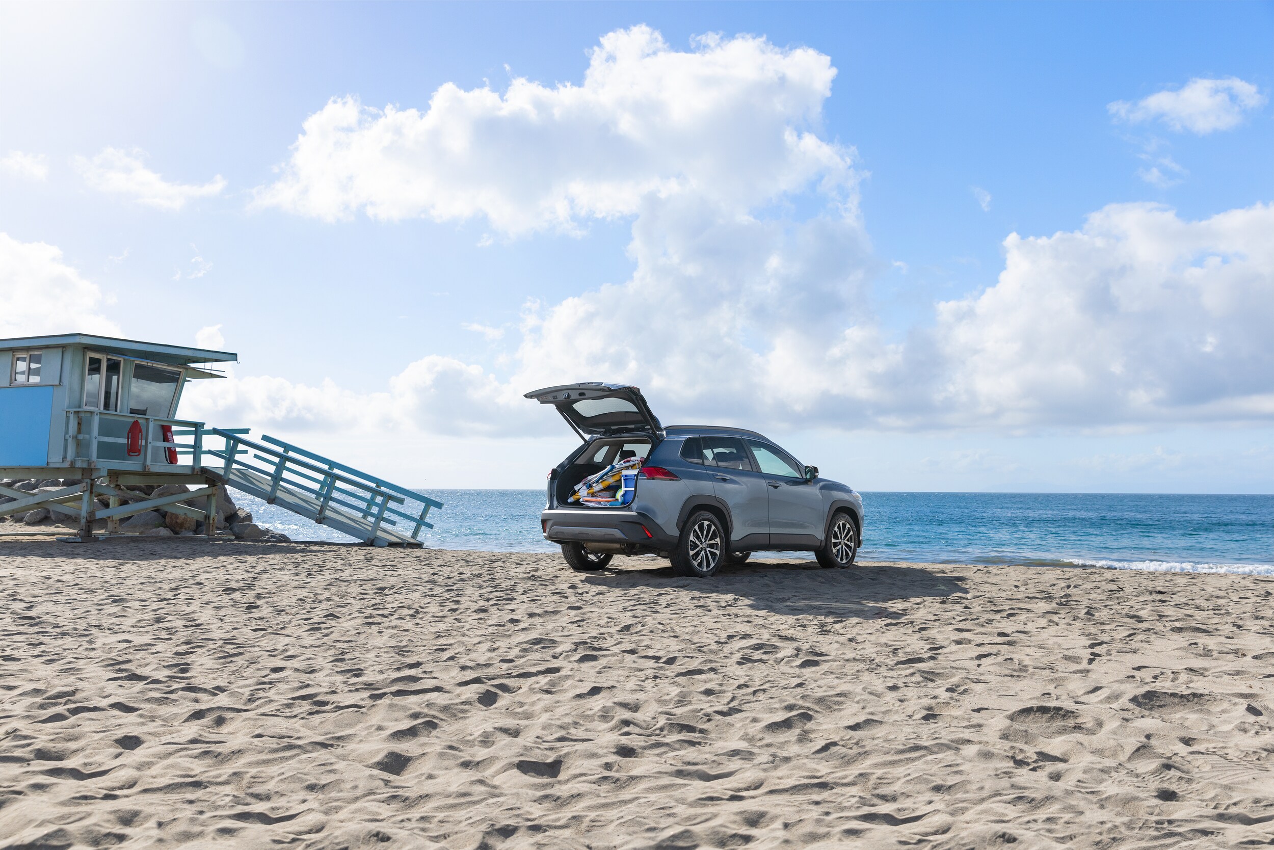 Toyota Corolla Cross parked on beach