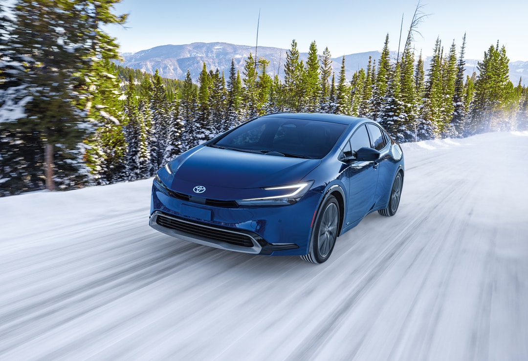 Toyota Prius driving in snow