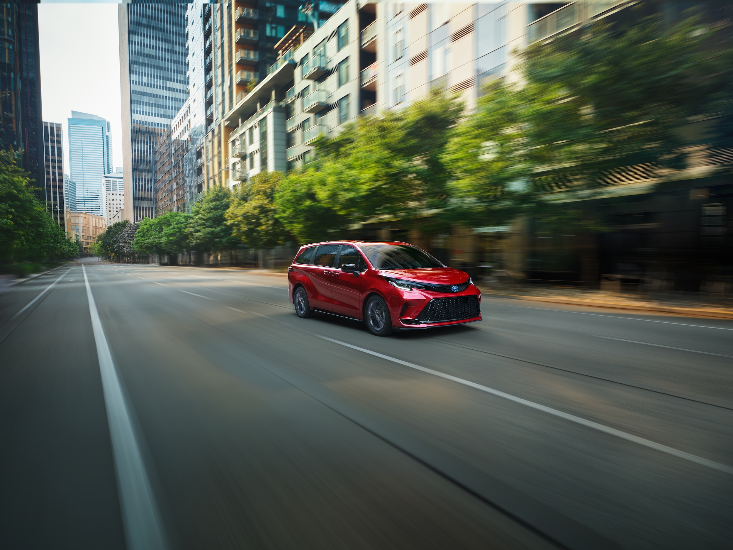  2026 Toyota Sienna driving in the city