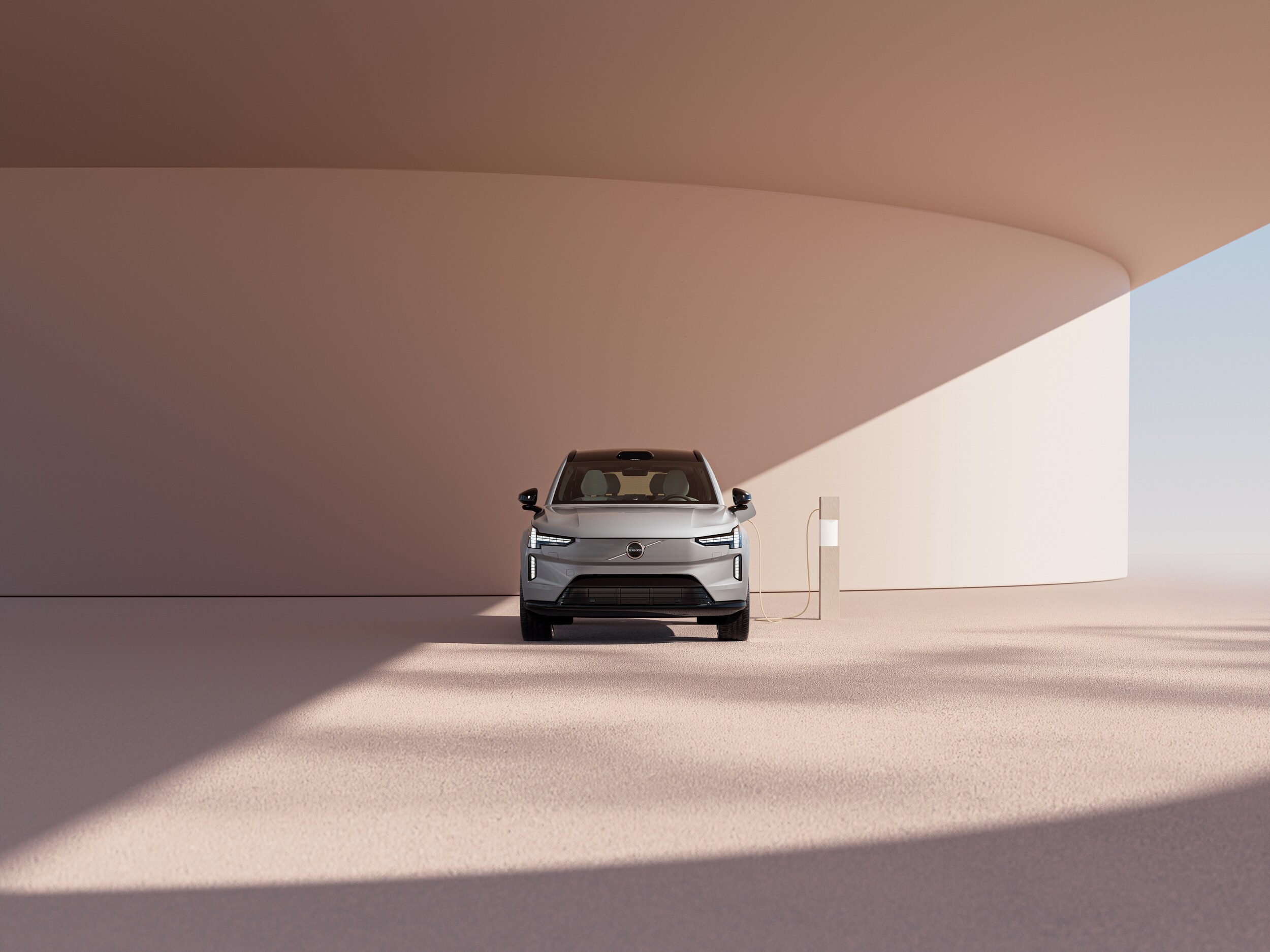 Volvo EX90 at charging station