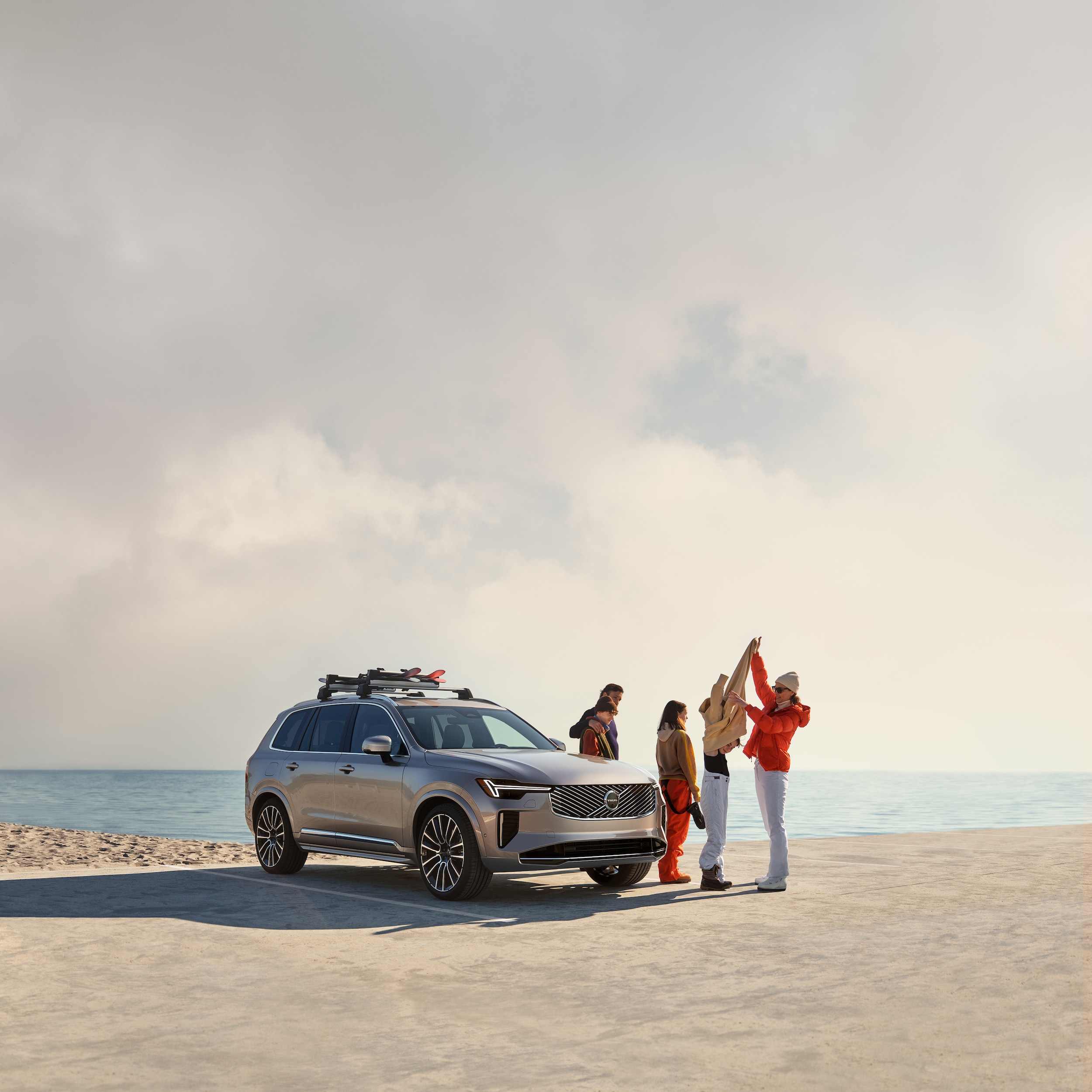  Family on beach with 2026 Volvo XC90