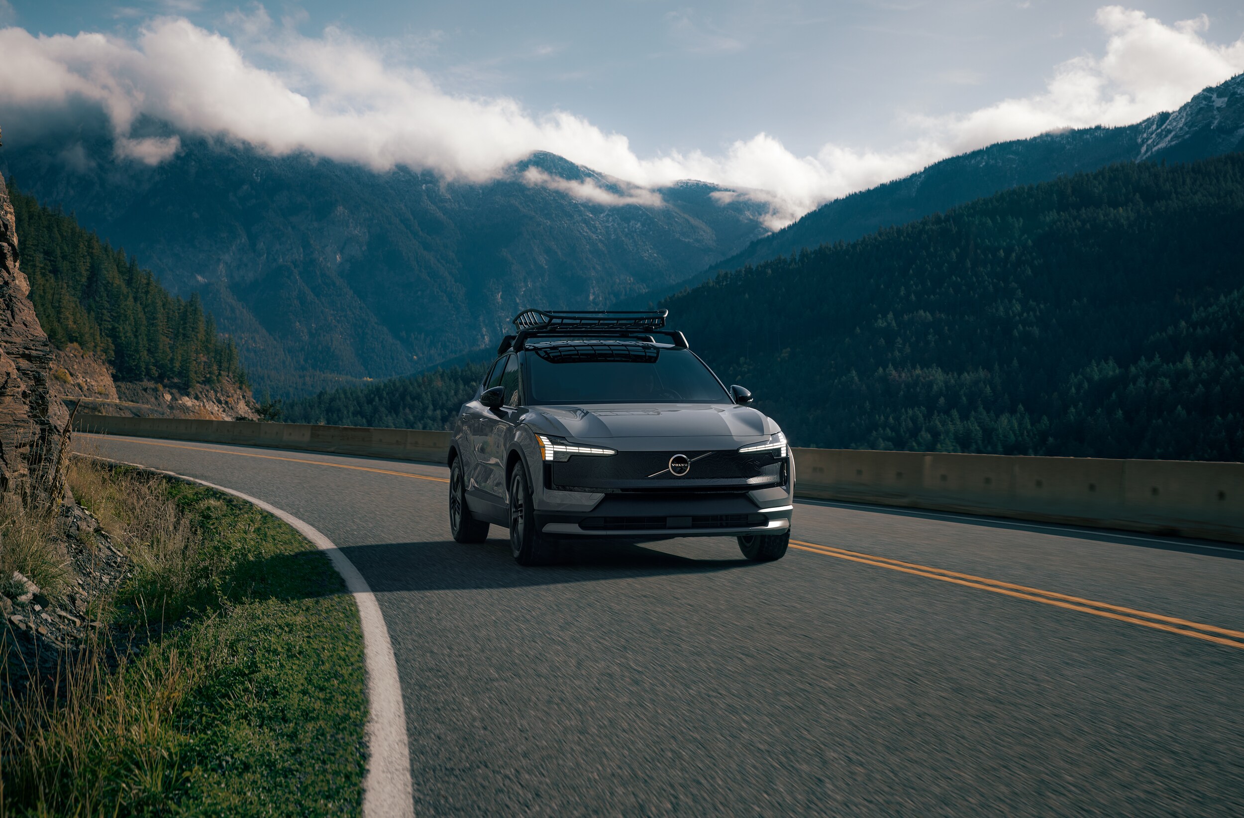 Volvo EX30 with roof rack on highway
