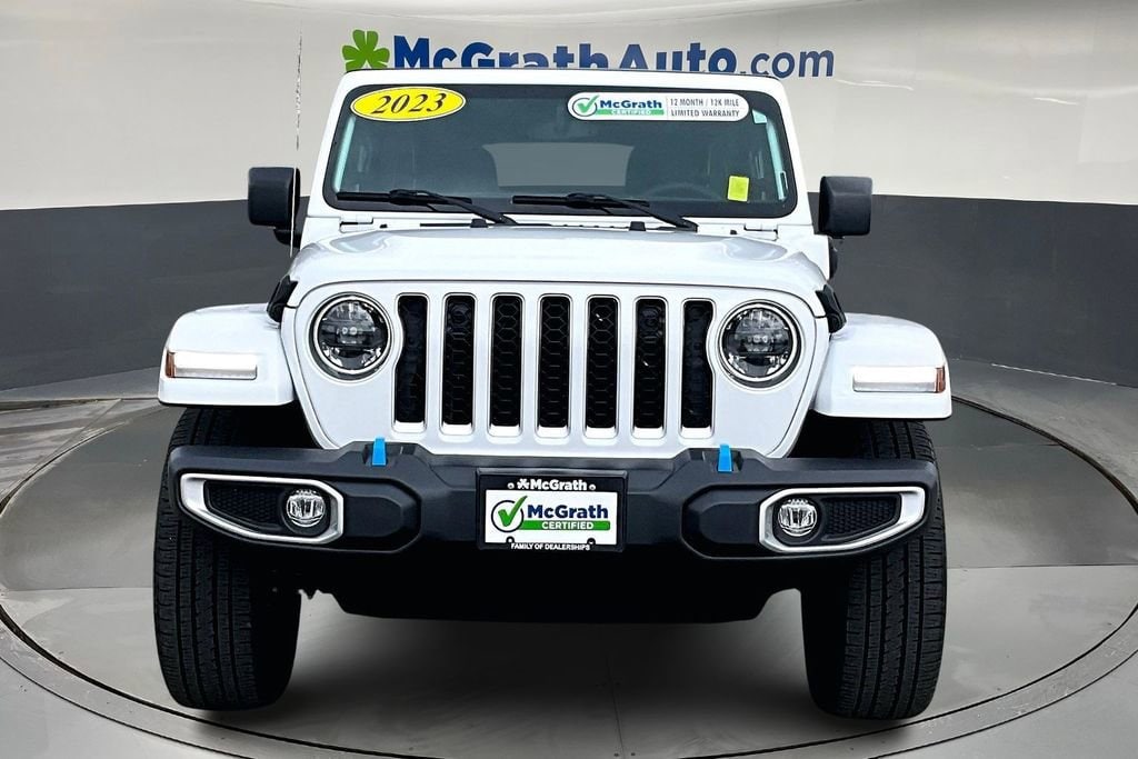 Used 2023 Jeep Wrangler 4xe Sahara 4XE with VIN 1C4JJXP67PW651105 for sale in Hiawatha, IA
