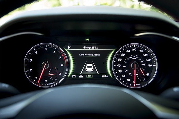 Lane Keeping Assist saftey feature displayed in the gauge cluster