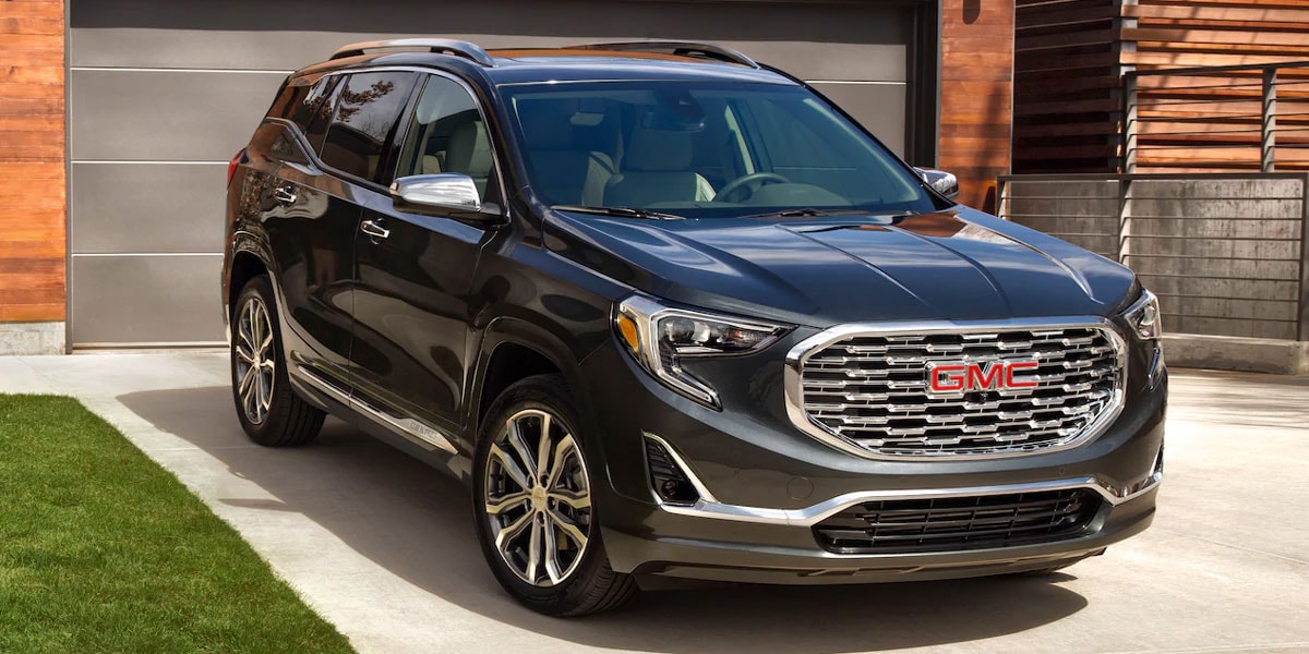 Terrain Denali outside a house
