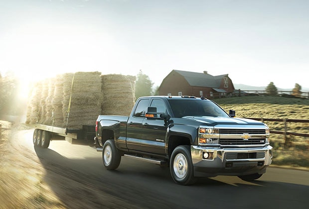 Chevy Silverado hauling hay