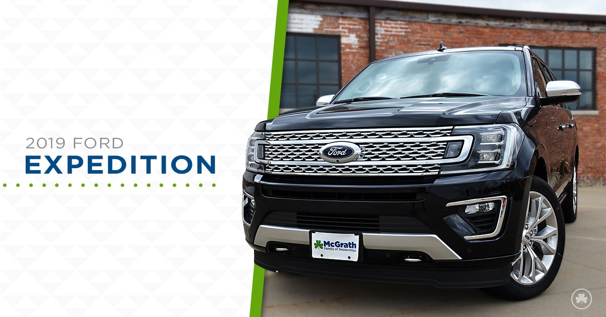 2019 Black Ford Expedition parked next to brick building