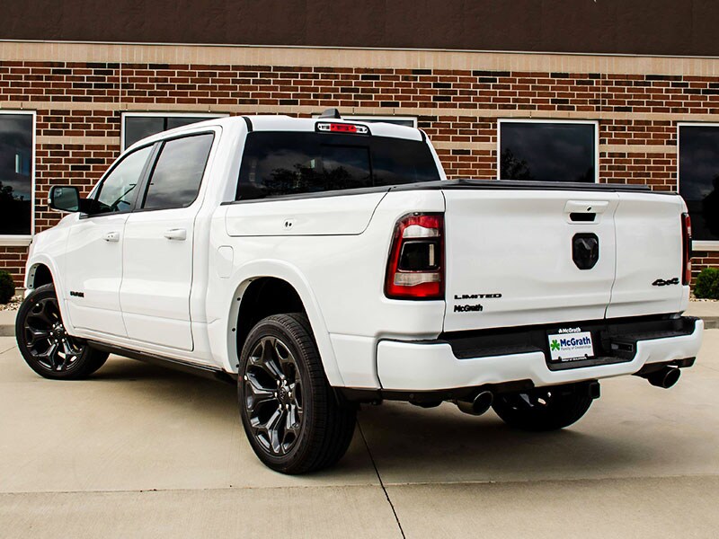 2021 Ram 1500 rear exterior parked next to building