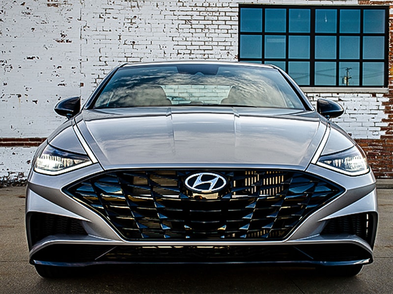 2020 Hyundai Sonata front exterior parked next to a brick building